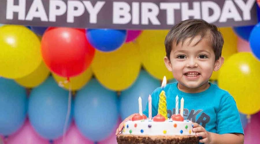 Sweet and Cute Boy with birthday cake.